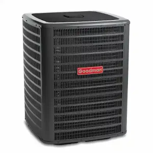 Goodman outdoor AC condenser unit isolated on a light gray background.